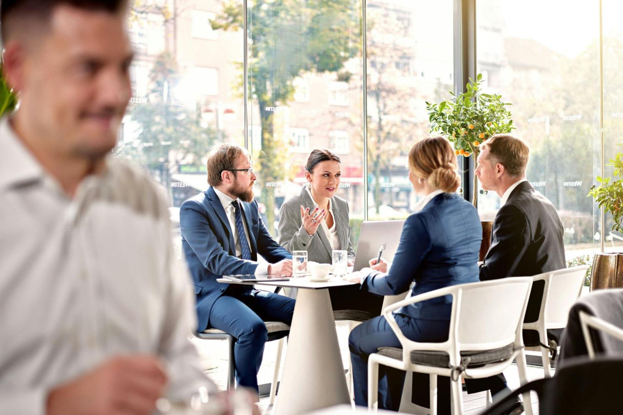 The Westin Zagreb Hotel Exterior photo Businesspeople in a meeting